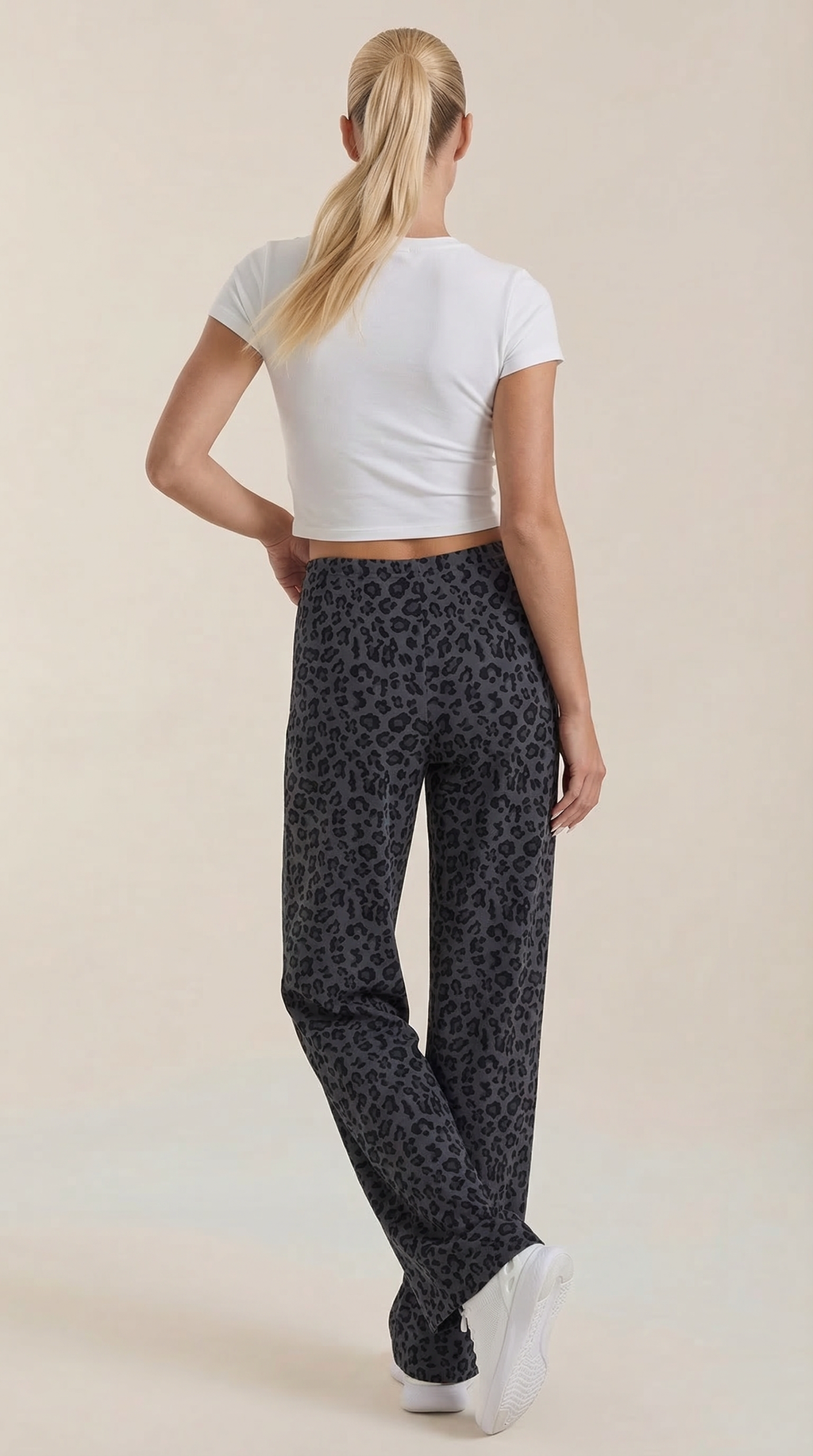 Pantalón Cleo de Estampado Animal con Corte de Pierna Ancha